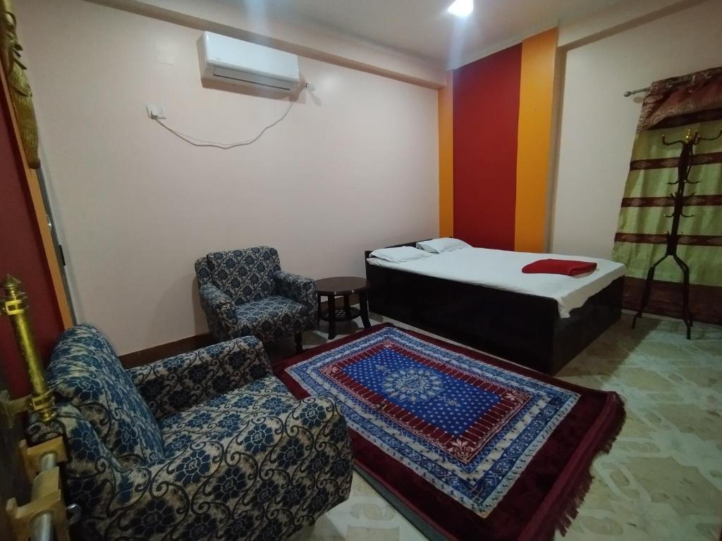 Posezení v ubytování Jayalaxmi guest House
