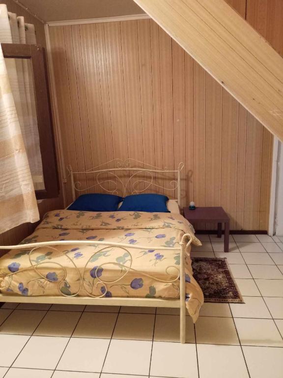 Postel nebo postele na pokoji v ubytování Grande Maison atypique proche du Maïdo