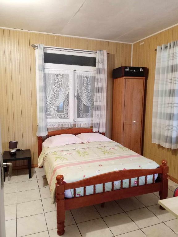 Postel nebo postele na pokoji v ubytování Grande Maison atypique proche du Maïdo
