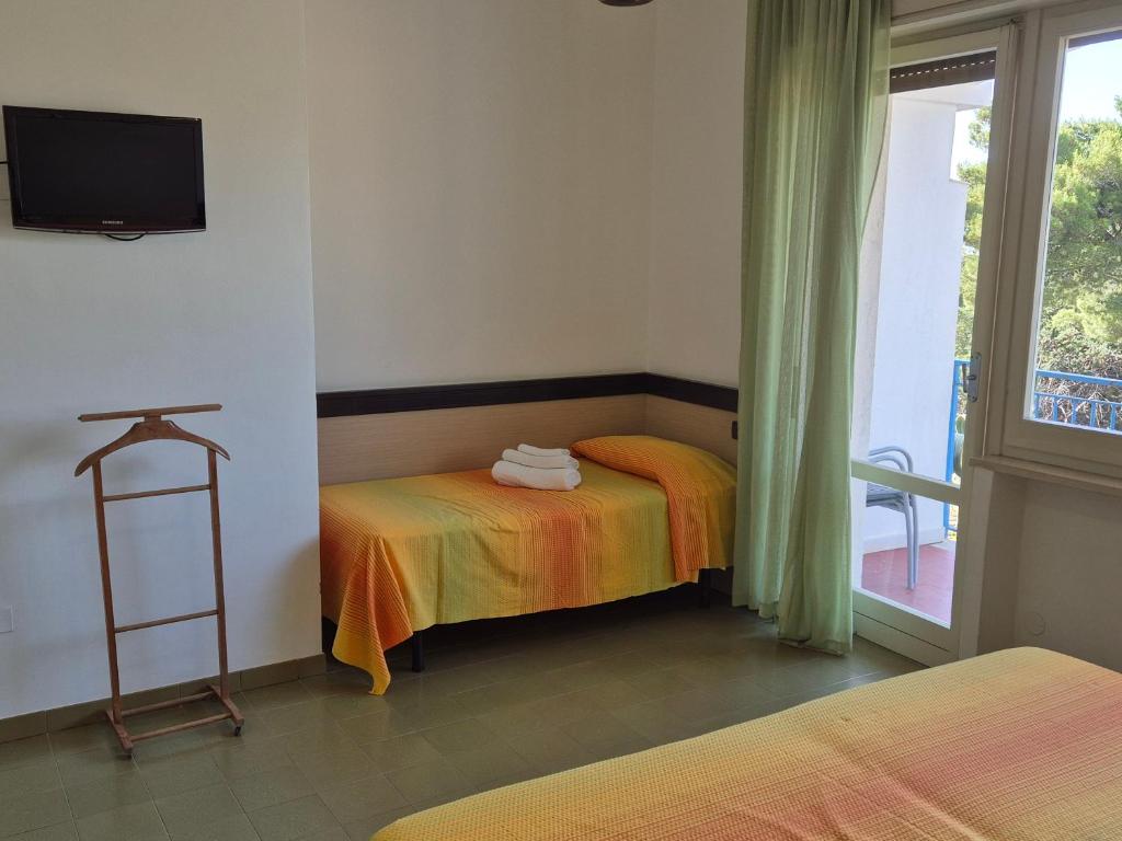 Postel nebo postele na pokoji v ubytování Hotel Guardacosta