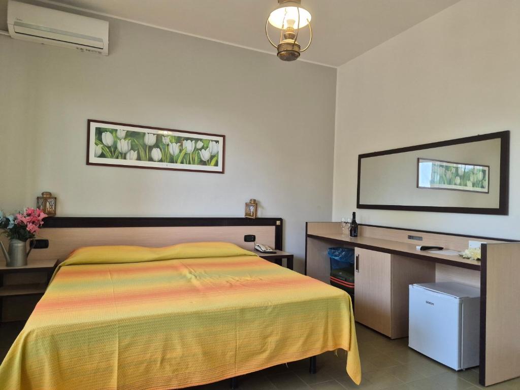Postel nebo postele na pokoji v ubytování Hotel Guardacosta