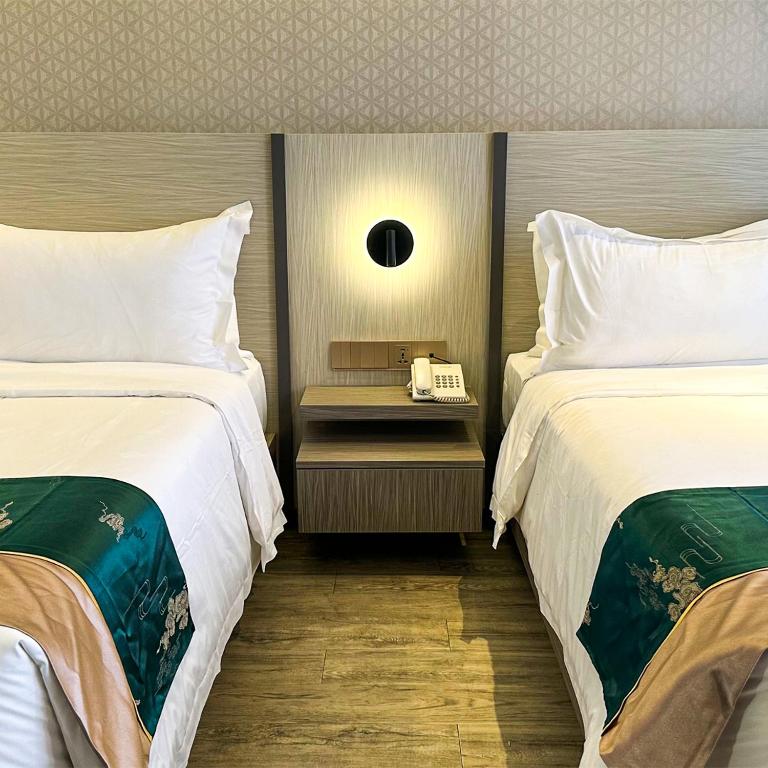Postel nebo postele na pokoji v ubytování Badsbrotel Suites