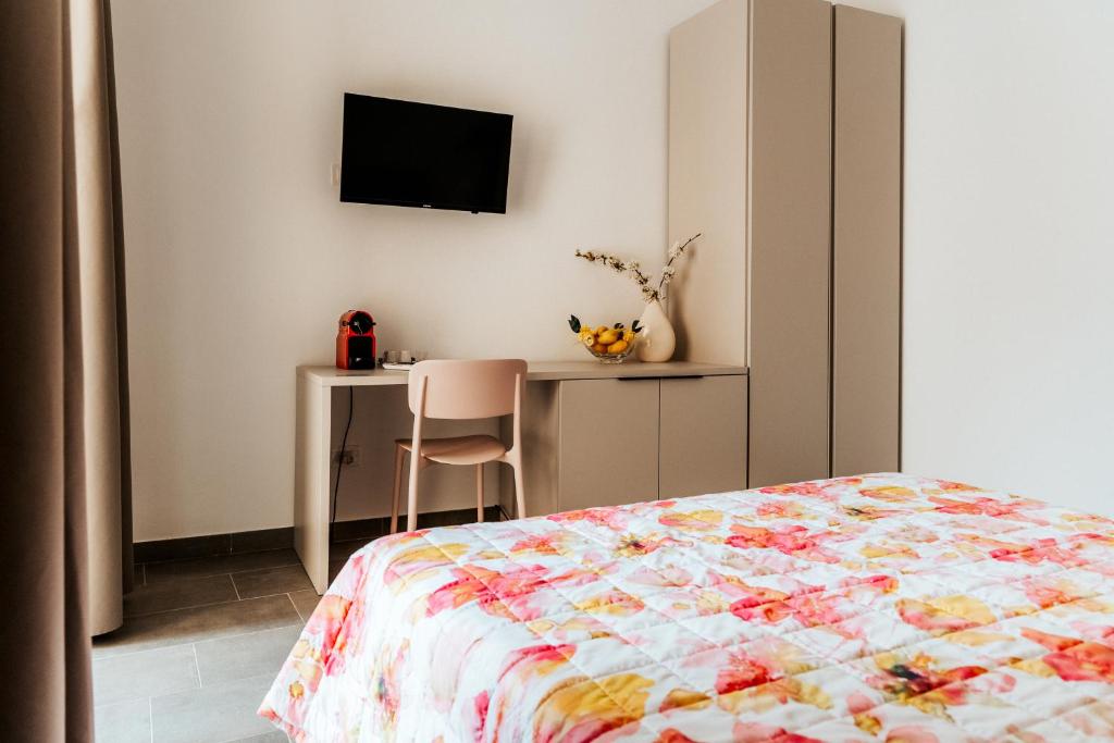 Postel nebo postele na pokoji v ubytování ALLA RIPA di RIO