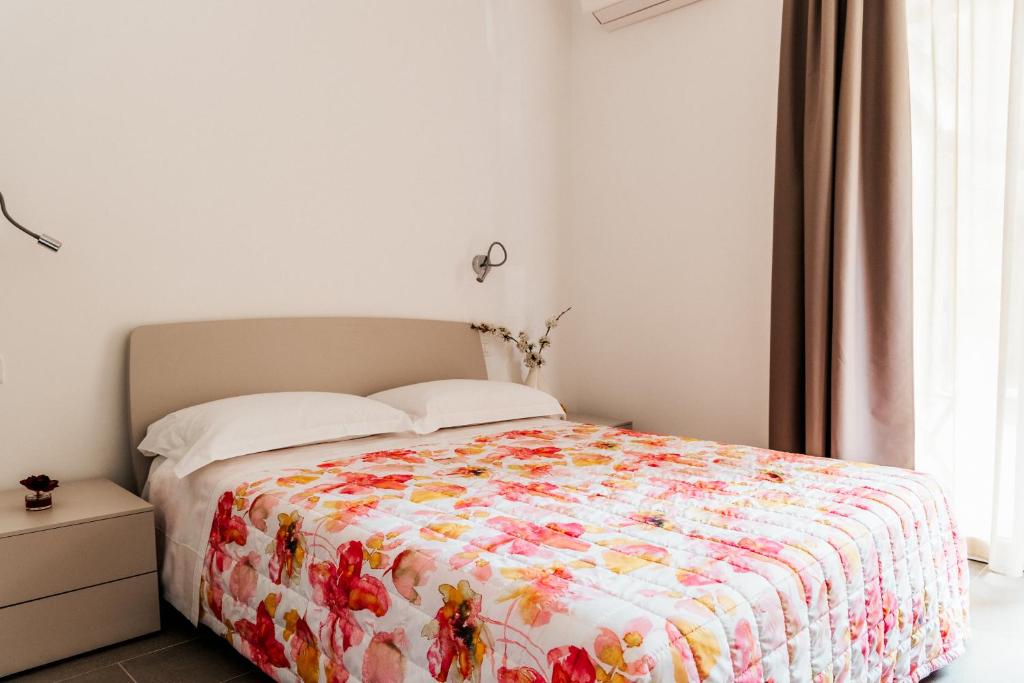 Postel nebo postele na pokoji v ubytování ALLA RIPA di RIO