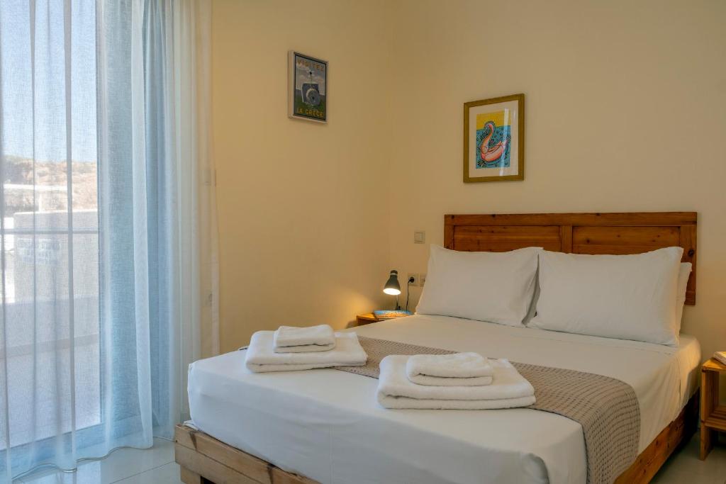 Posteľ alebo postele v izbe v ubytovaní Aris Apartment
