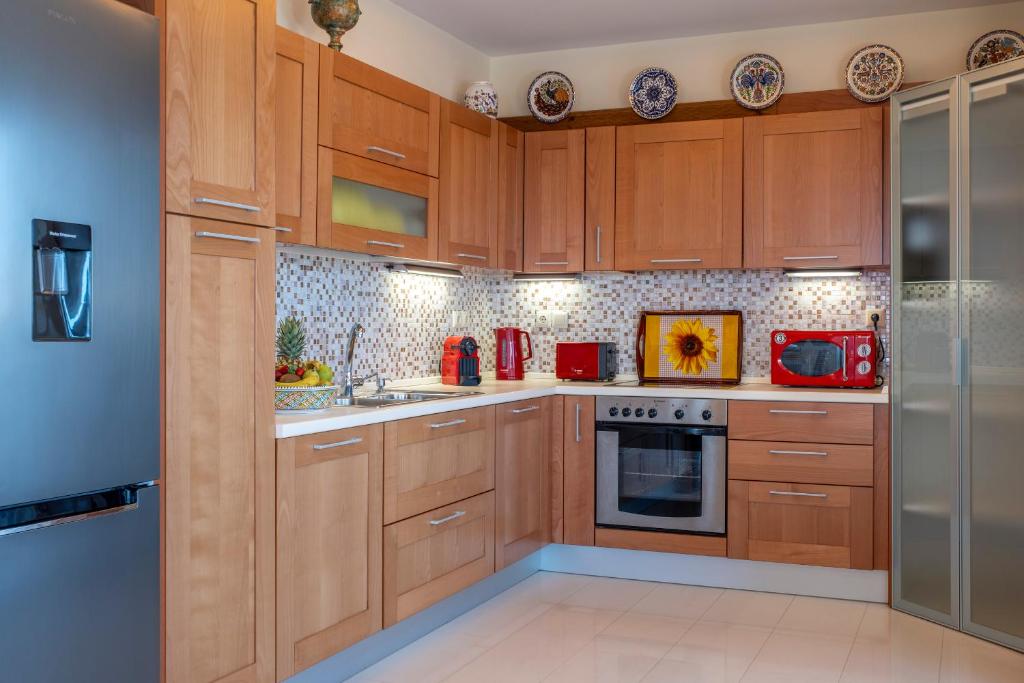 Kuchyňa alebo kuchynka v ubytovaní Aris Apartment