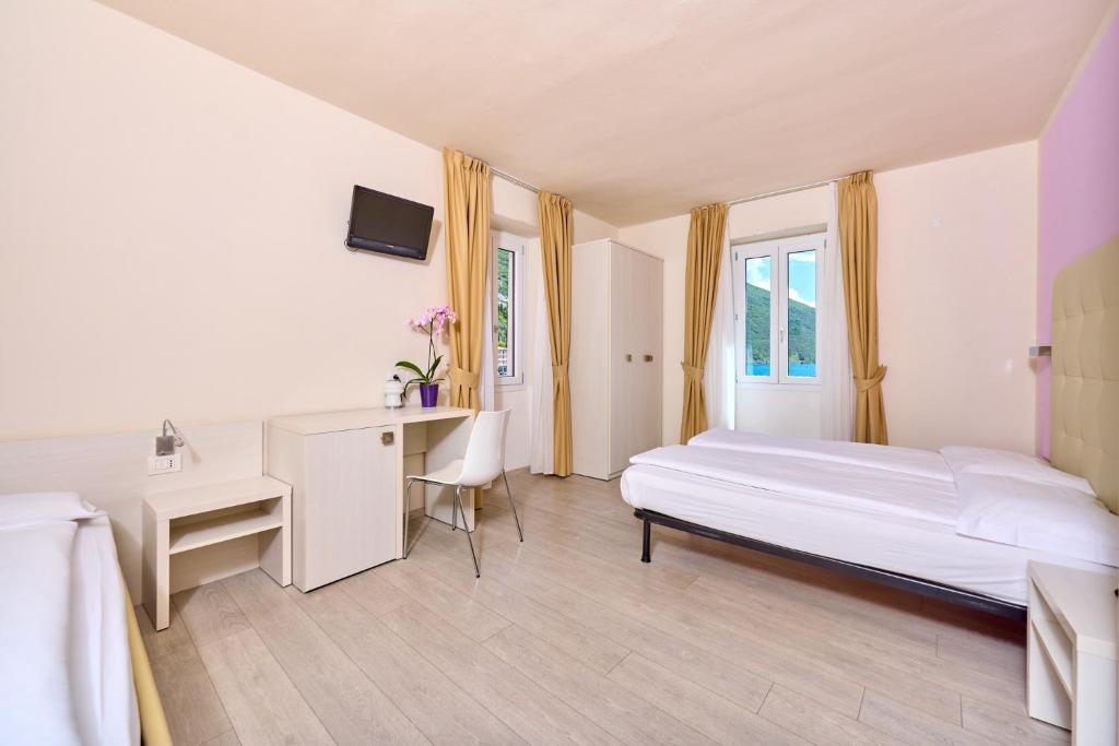 Postel nebo postele na pokoji v ubytování Hotel Geier