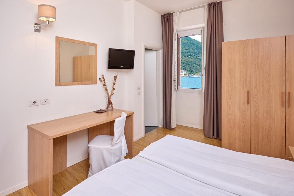 Postel nebo postele na pokoji v ubytování Hotel Geier