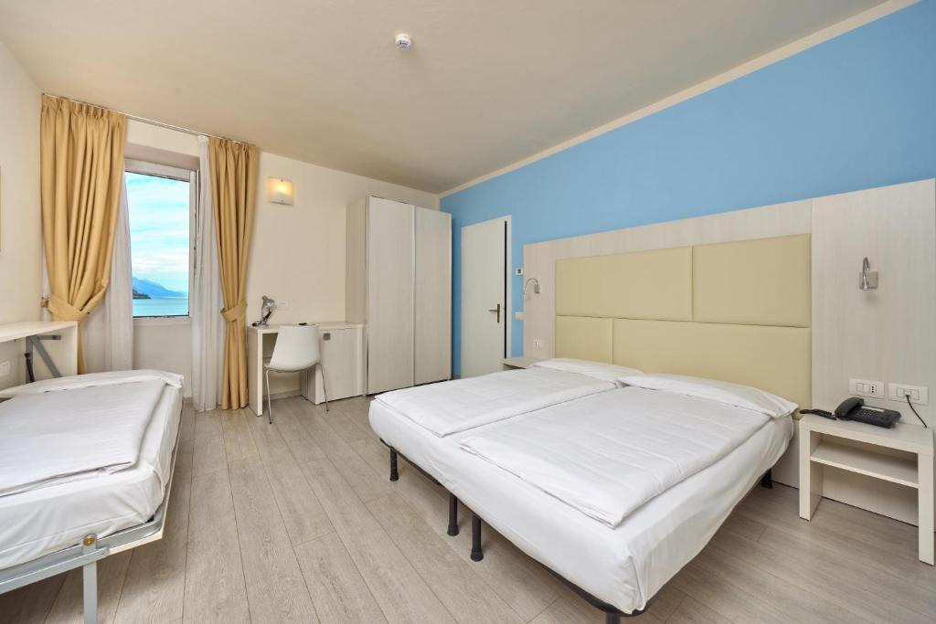 Postel nebo postele na pokoji v ubytování Hotel Geier