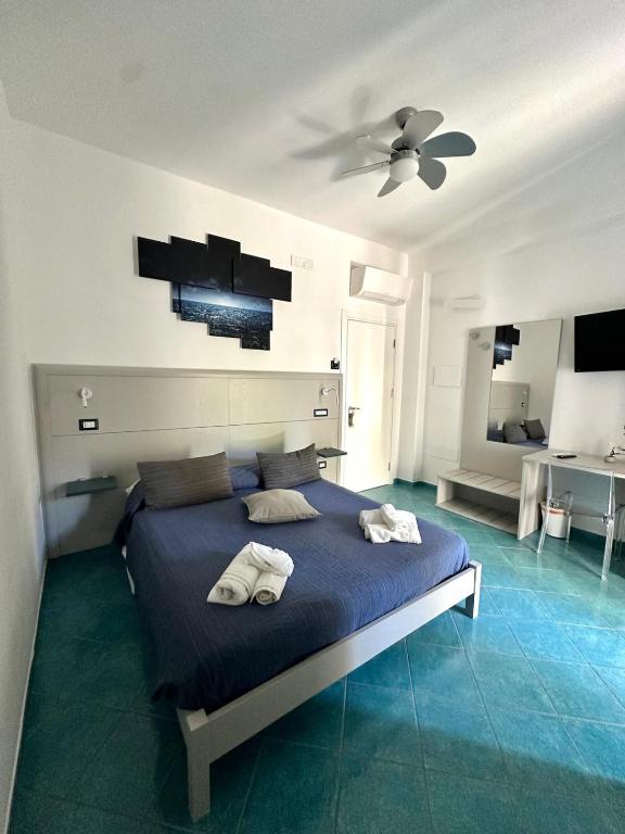 Postel nebo postele na pokoji v ubytování Belvedere Hotel-B&B