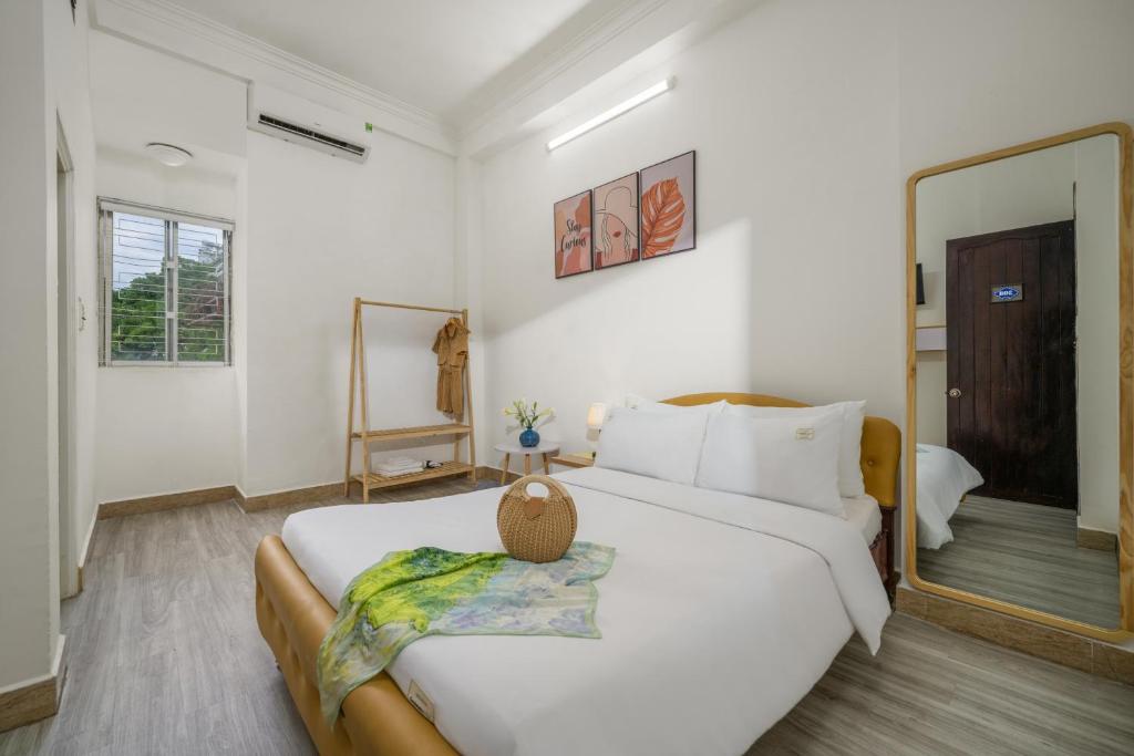 Postel nebo postele na pokoji v ubytování KLy Apartment Hotel