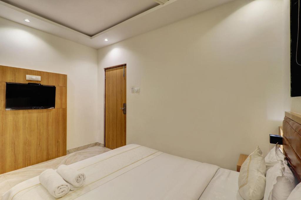 TV a/nebo společenská místnost v ubytování Hotel A K Fort Inn