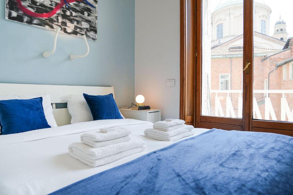 Posteľ alebo postele v izbe v ubytovaní Duomo Center Apartment