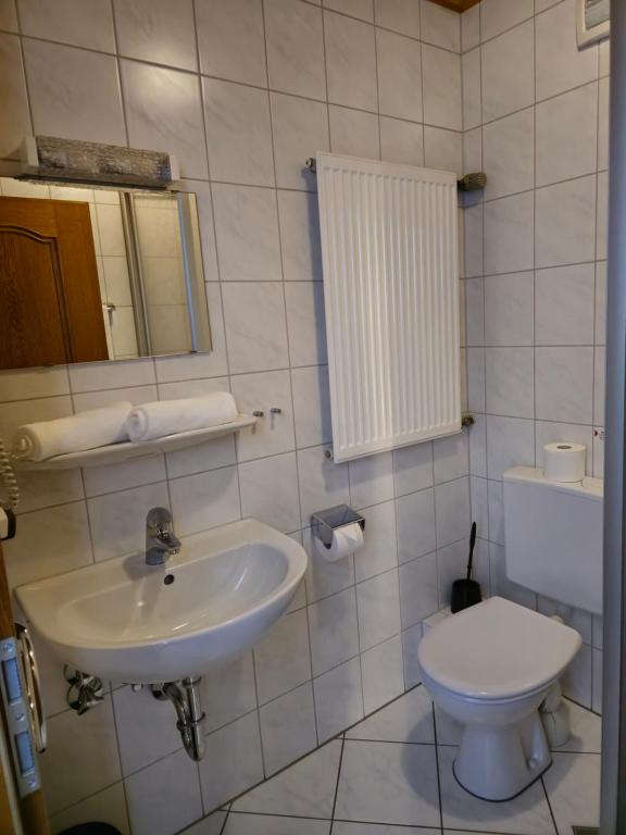 Koupelna v ubytování Gasthof Tut