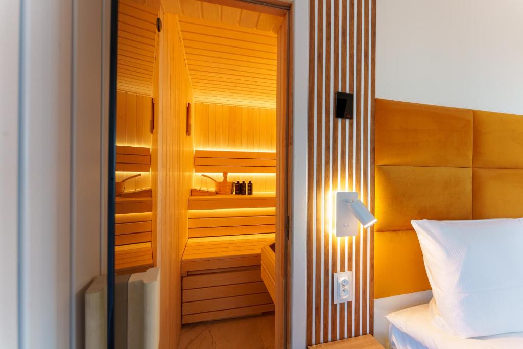 Posteľ alebo postele v izbe v ubytovaní Oaza Spa z prywatną Sauną by Perłowa Przystań Rent