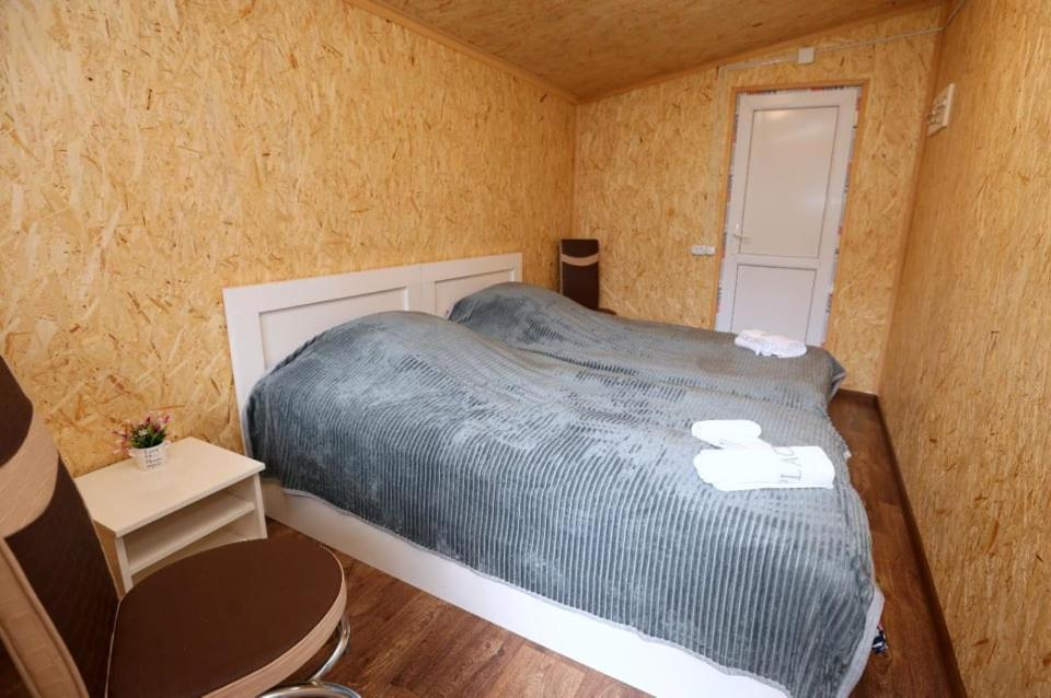 Postel nebo postele na pokoji v ubytování Forest Cabins