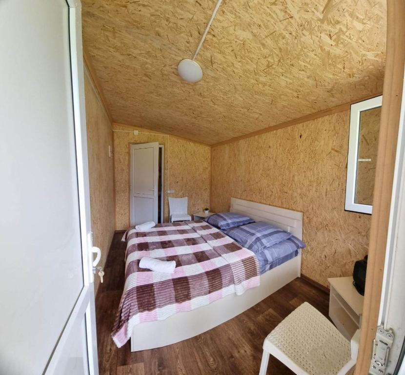 Postel nebo postele na pokoji v ubytování Forest Cabins