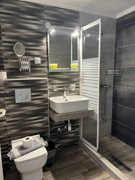 Koupelna v ubytování Ellas Hotel