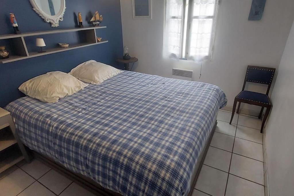 Un ou plusieurs lits dans un hébergement de l'établissement Maison l'EscaleTaussat Les Bains