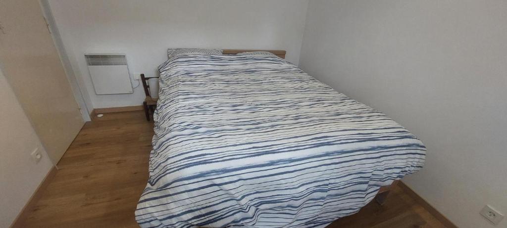 Un ou plusieurs lits dans un hébergement de l'établissement Maison l'EscaleTaussat Les Bains