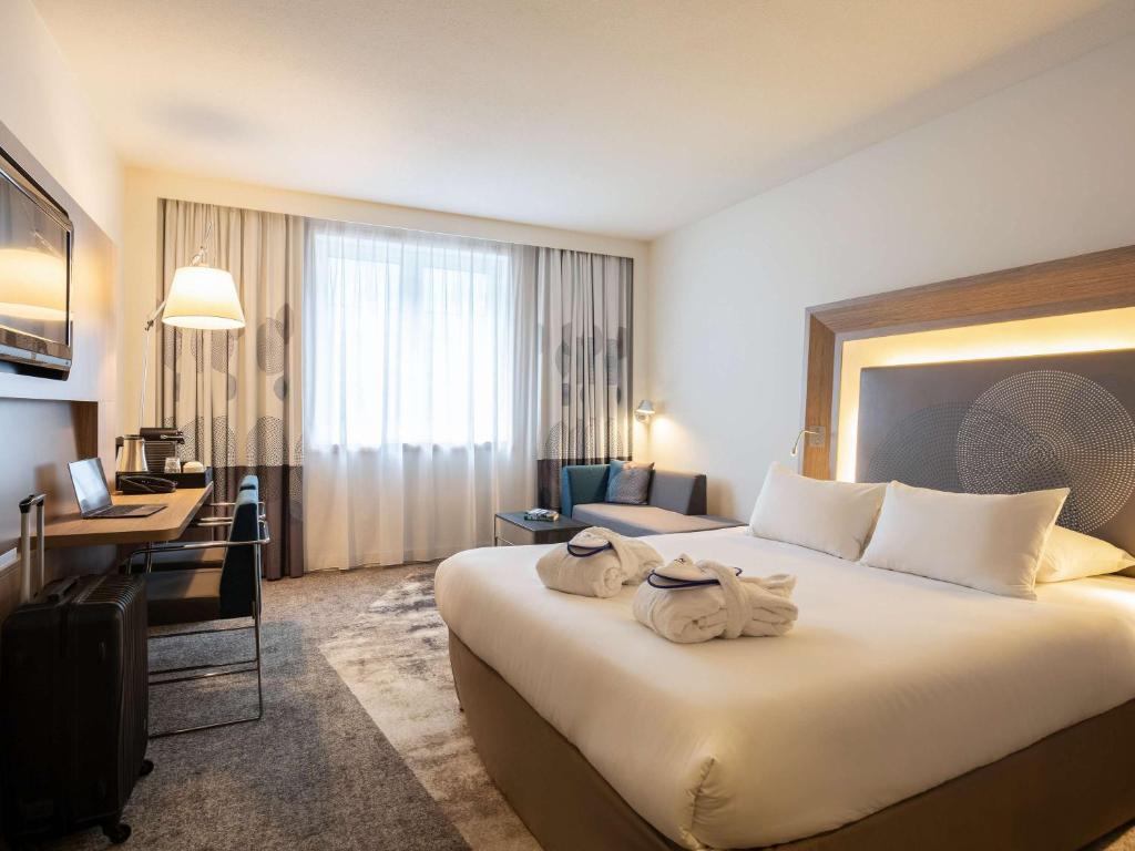 Postel nebo postele na pokoji v ubytování Novotel Brussels City Centre
