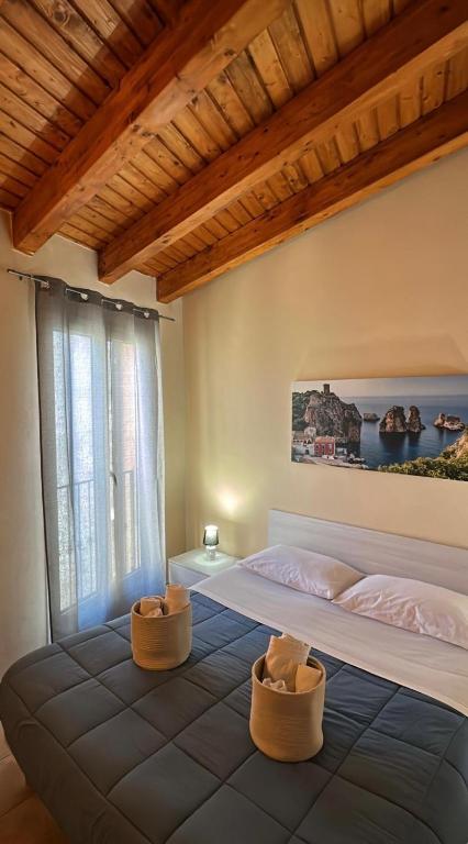 Postel nebo postele na pokoji v ubytování Domus Mea Apartments