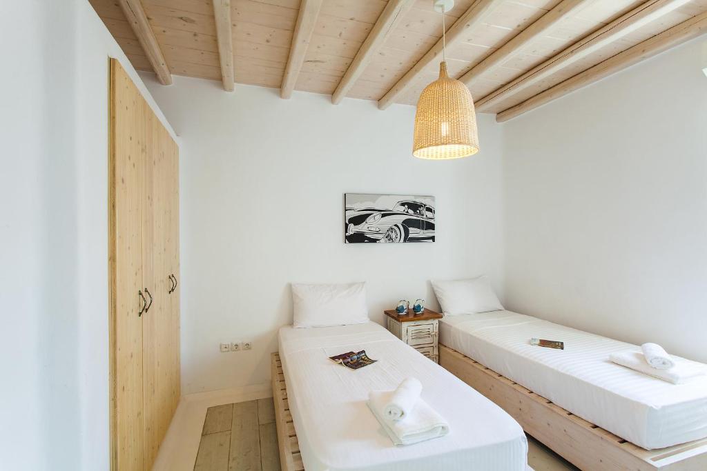 Łóżko lub łóżka w pokoju w obiekcie Villa Jasper by Mykonos Stays