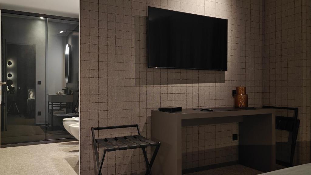 TV a/nebo společenská místnost v ubytování Zeta Rentals