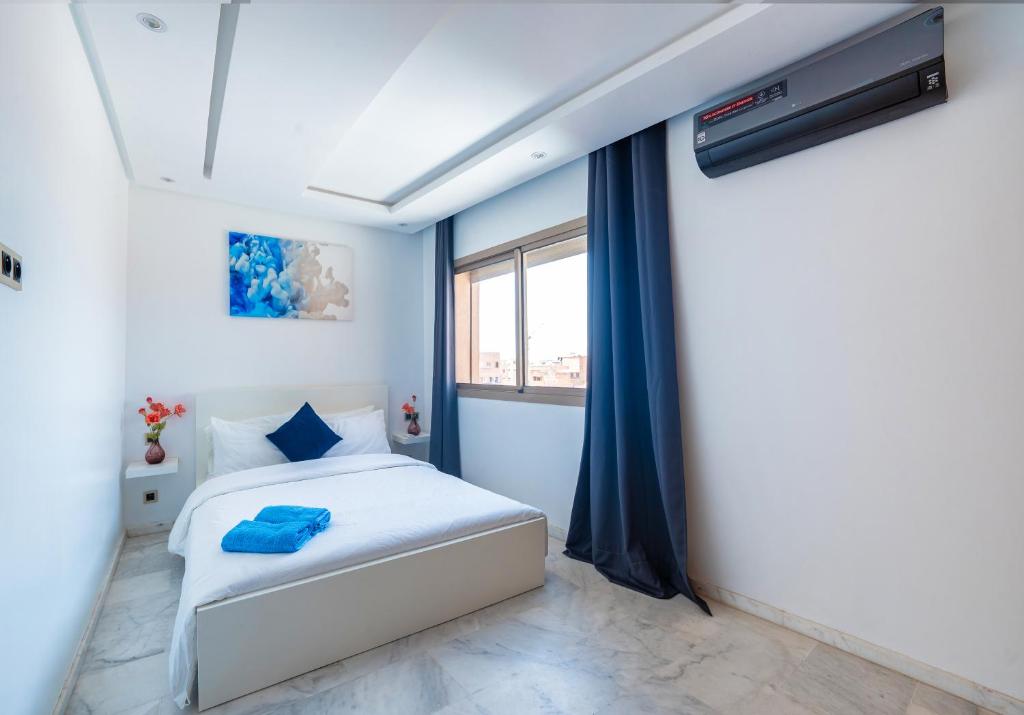 Una cama o camas en una habitación de Appartement au centre de gueliz
