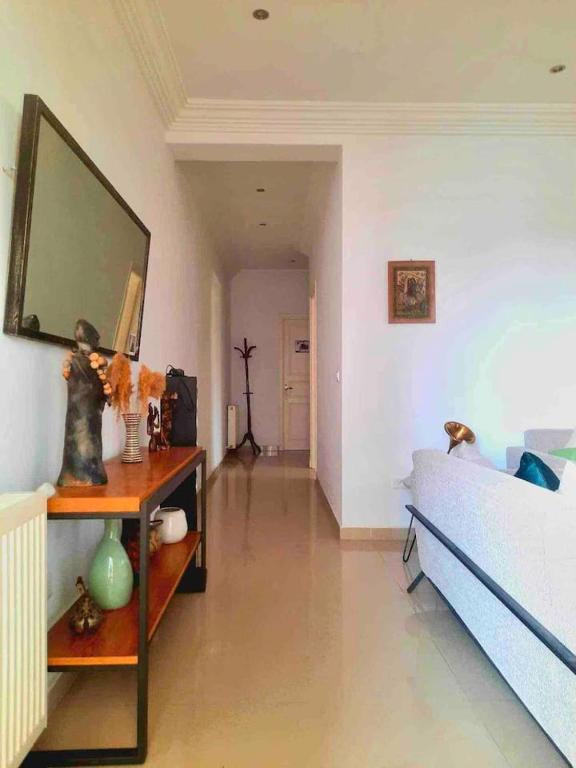 Postel nebo postele na pokoji v ubytování Appartement haut standing à Menzeh5