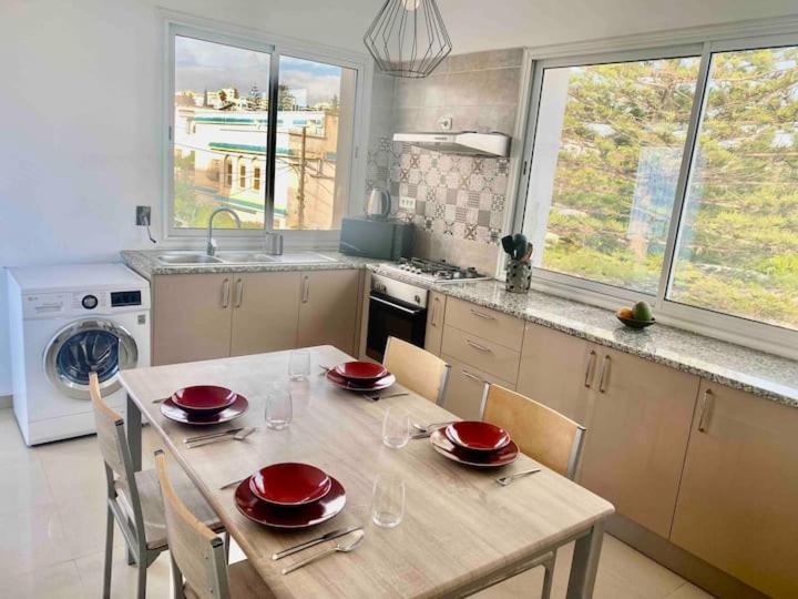 Kuchyň nebo kuchyňský kout v ubytování Appartement haut standing à Menzeh5