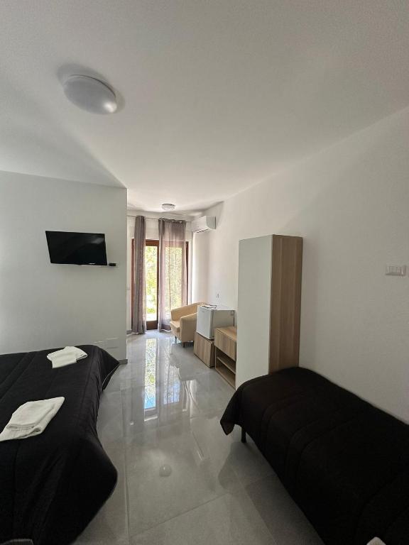 Agriturismo L'Oasi - Deluxe Driepersoonskamer