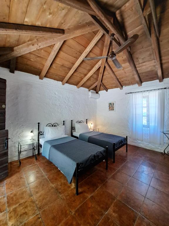 Posteľ alebo postele v izbe v ubytovaní Tsivouli Accommodation