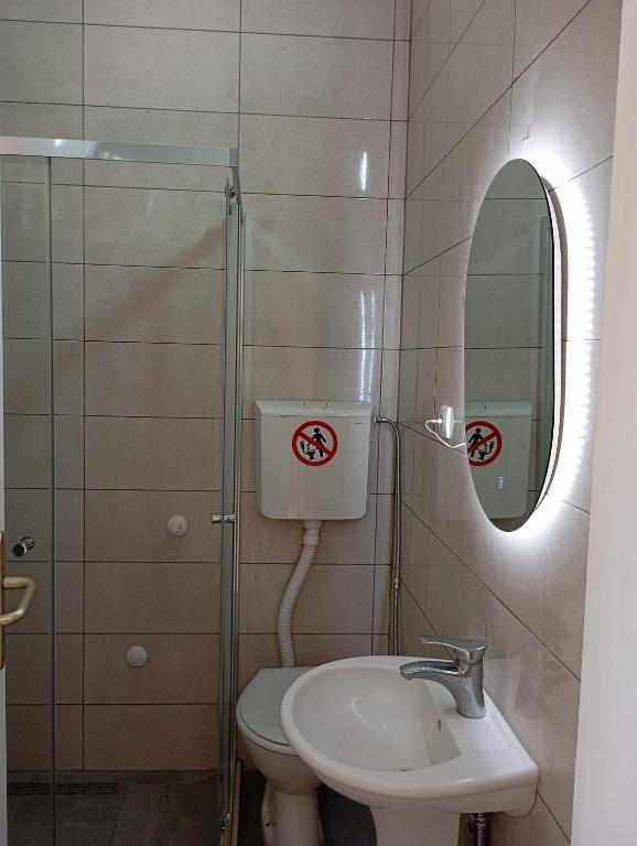 Vonios kambarys apgyvendinimo įstaigoje Apartments Zenit