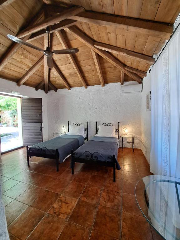 Posteľ alebo postele v izbe v ubytovaní Tsivouli Accommodation