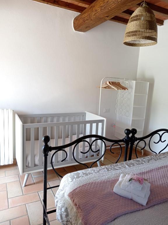 Postel nebo postele na pokoji v ubytování Casale - La Camera di Leda