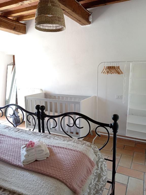 Postel nebo postele na pokoji v ubytování Casale - La Camera di Leda