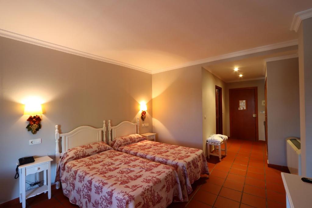 Postel nebo postele na pokoji v ubytování Hotel Varinia Serena - Balneario de Alange