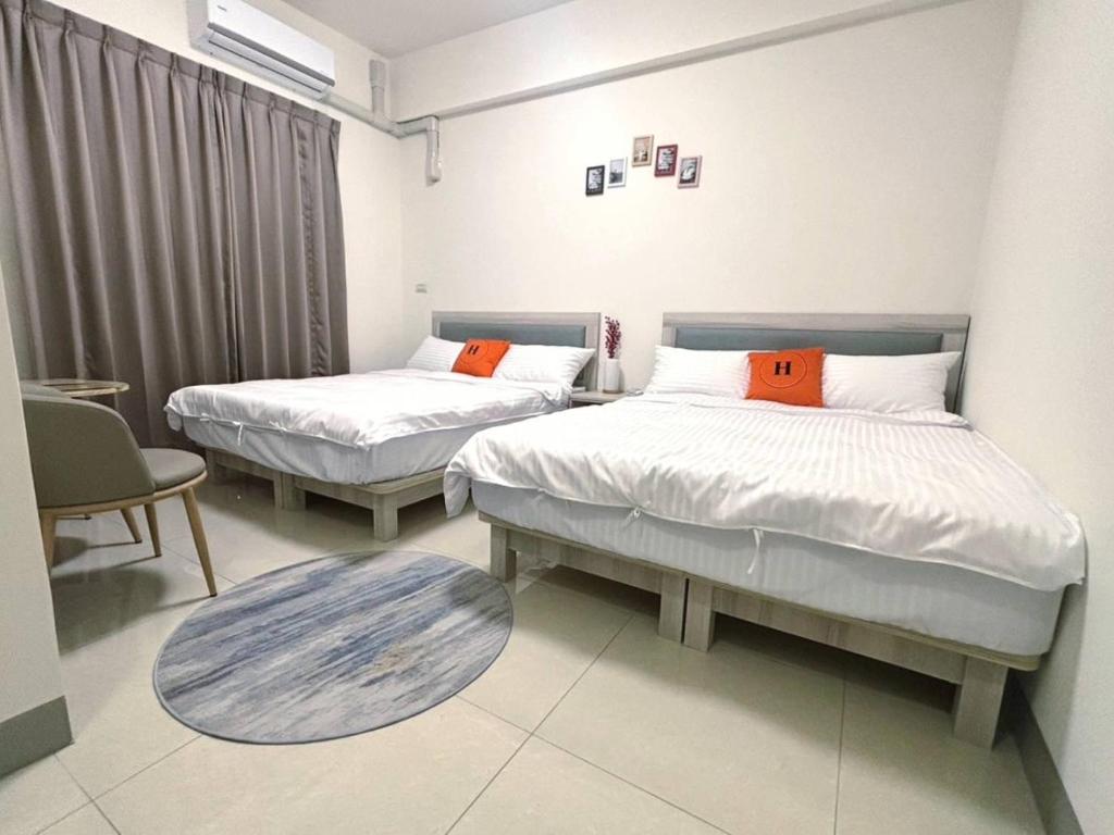 Postel nebo postele na pokoji v ubytování Ling Lai B&B