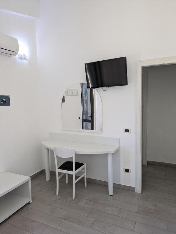 TV a/nebo společenská místnost v ubytování Hotel 4 Lampioni