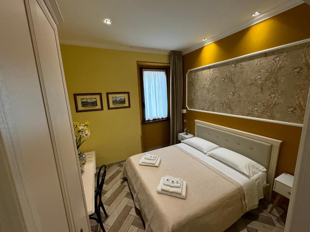Posteľ alebo postele v izbe v ubytovaní B&B Fiorentino