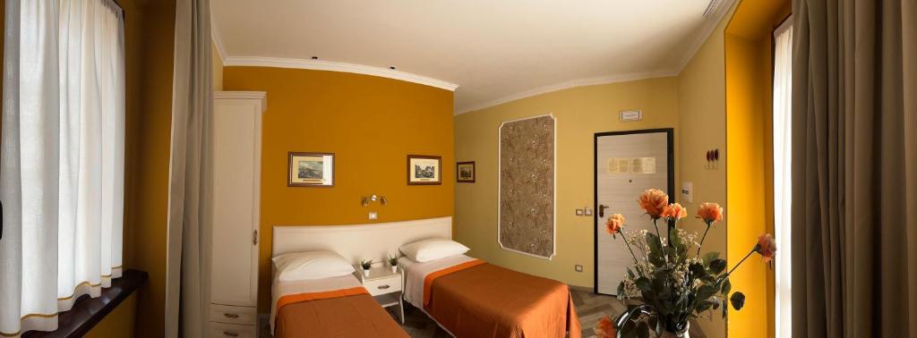 Posteľ alebo postele v izbe v ubytovaní B&B Fiorentino