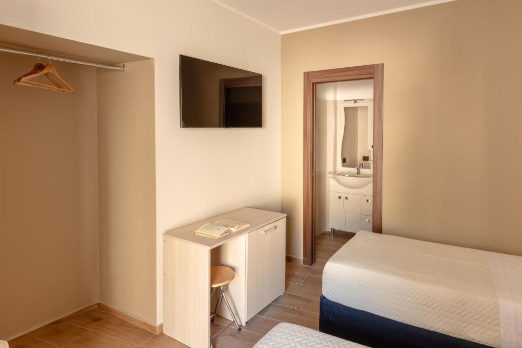 Postel nebo postele na pokoji v ubytování CasaTecla