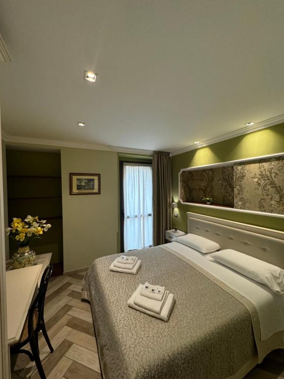 Posteľ alebo postele v izbe v ubytovaní B&B Fiorentino