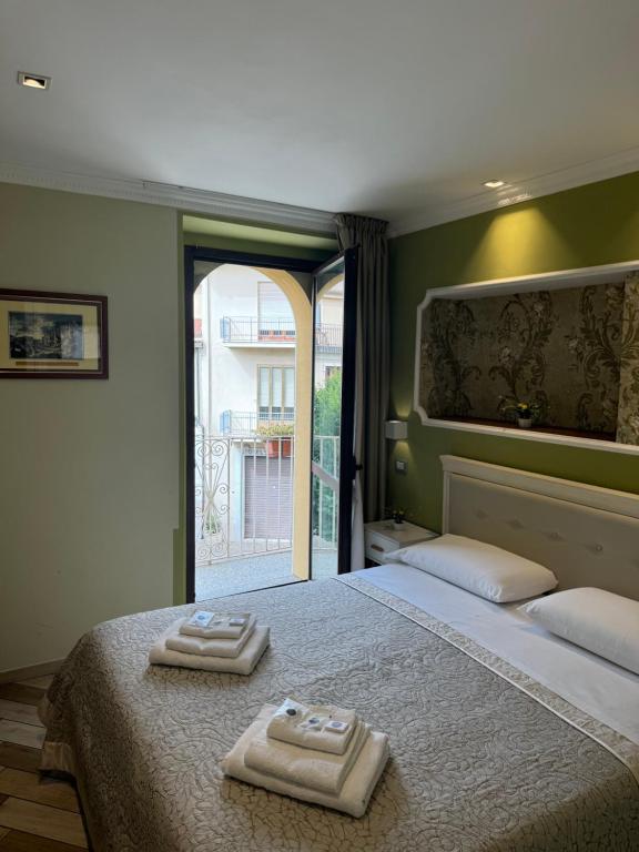Posteľ alebo postele v izbe v ubytovaní B&B Fiorentino