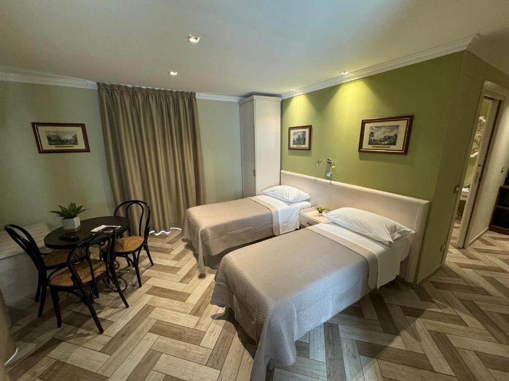 Posteľ alebo postele v izbe v ubytovaní B&B Fiorentino