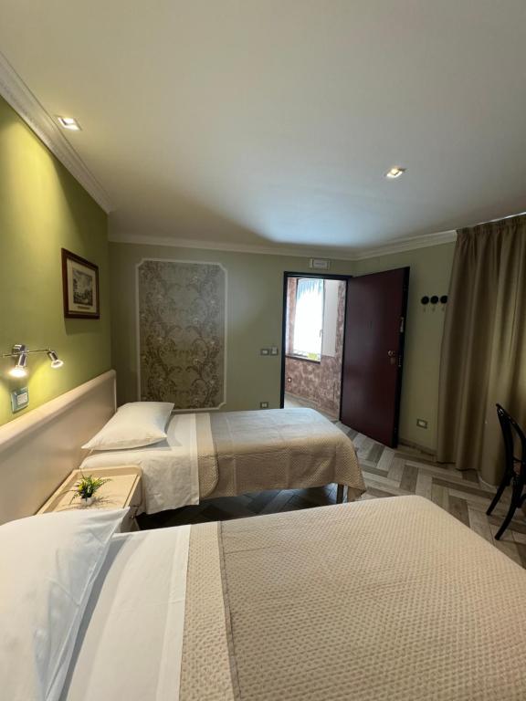 Posteľ alebo postele v izbe v ubytovaní B&B Fiorentino