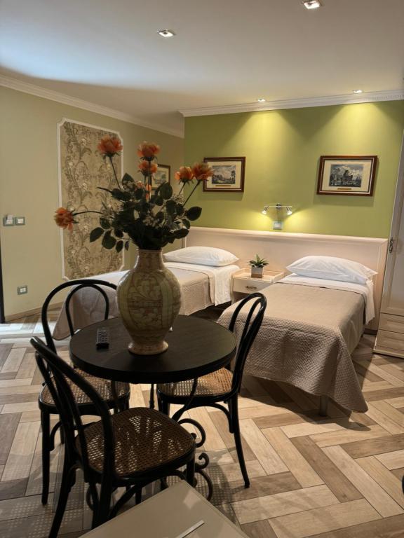Posteľ alebo postele v izbe v ubytovaní B&B Fiorentino