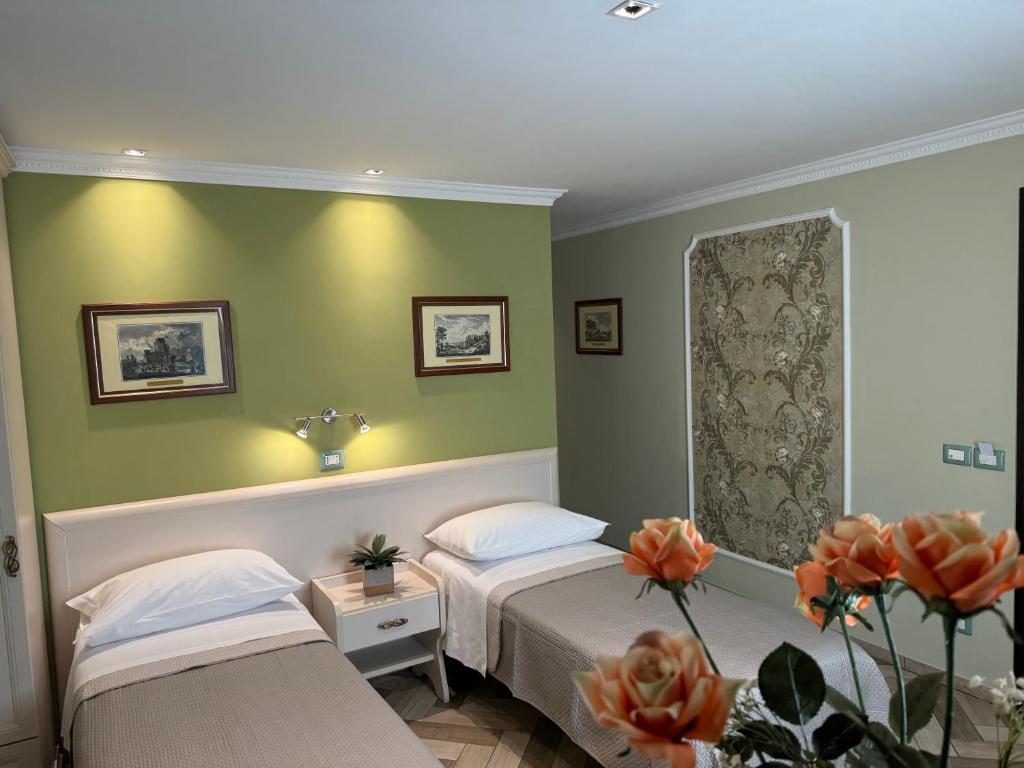 Posteľ alebo postele v izbe v ubytovaní B&B Fiorentino