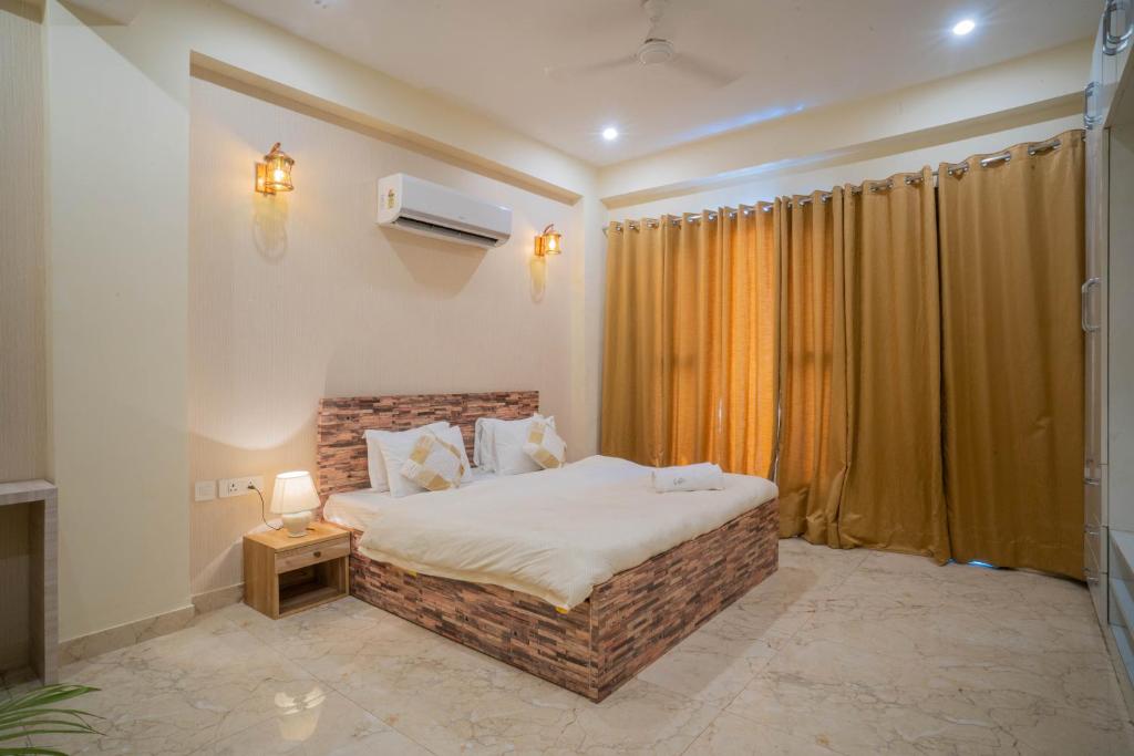 Hostie Eva Dreams - Private 2 BHK Apartments near Artemis, Medanta, Fortis hospitals - Two-Bedroom Apartment